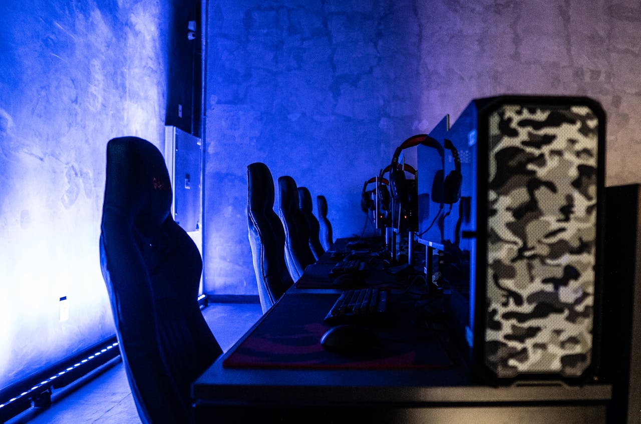 An Empty Gaming Computer Room With Blue Light