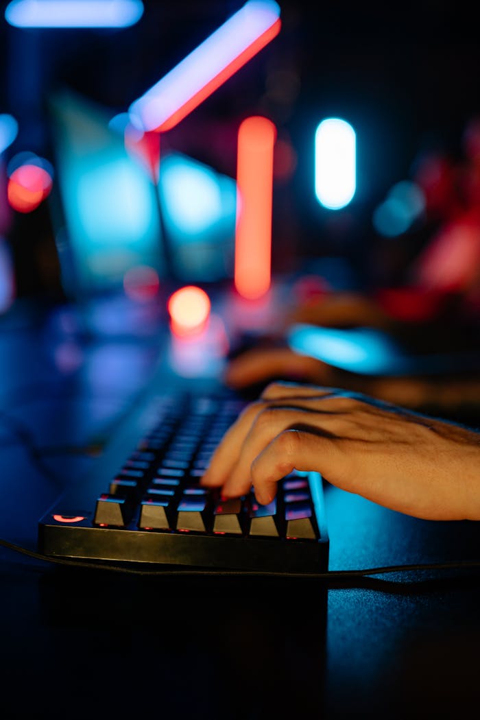 A Close-Up Shot of a Person Gaming on a Computer